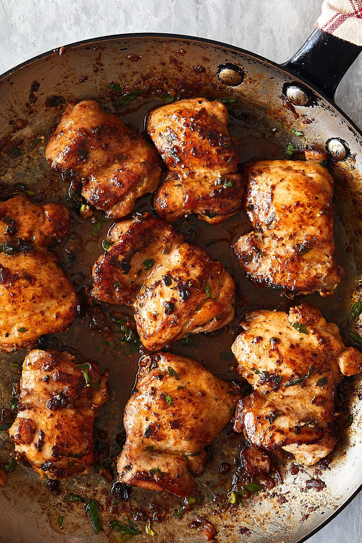 Roasted Peri Peri Thighs, 15oz — Skinless chicken thighs marinated in warm shawarma spice, roasted until charred at the edges. Protein only, no sides.