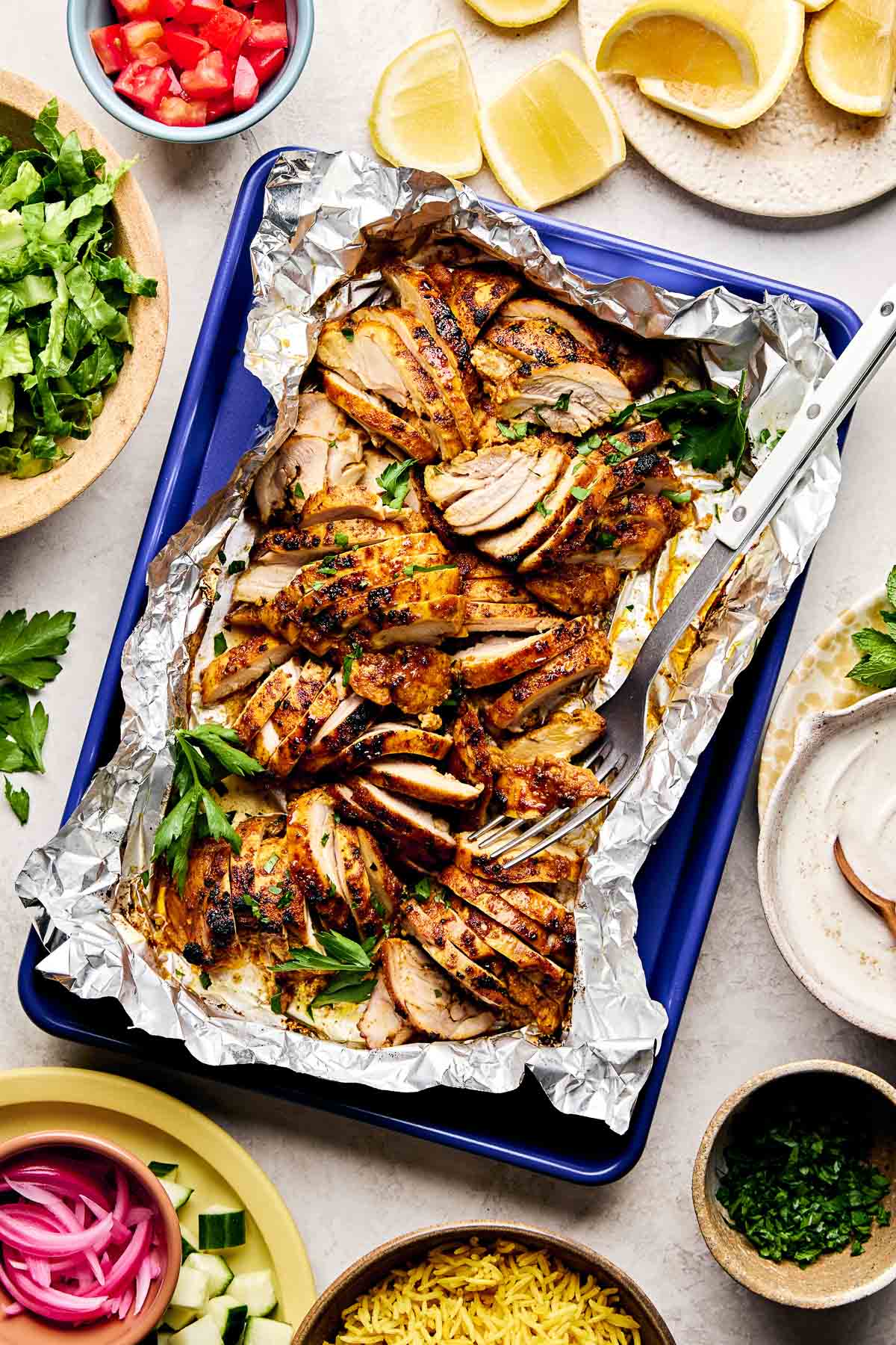 Chicken Shawarma, 15oz — Skinless chicken thighs marinated in warm shawarma spice, roasted until charred at the edges. Protein only, no sides.